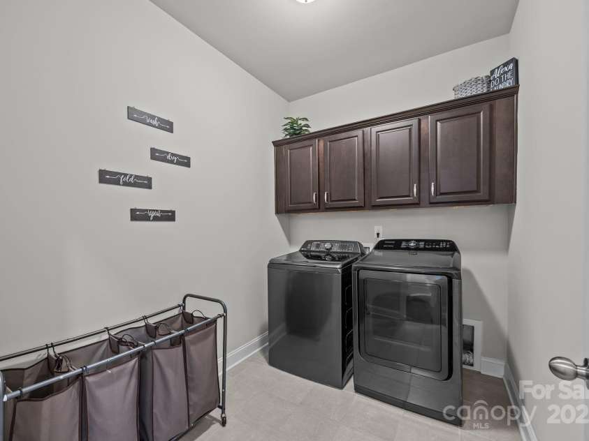 141 Rain Shadow Drive, Mooresville, NC 28115.  MLS# CAR4305913, YatesRealty ID 3144. Terrific Laundry room with Storage