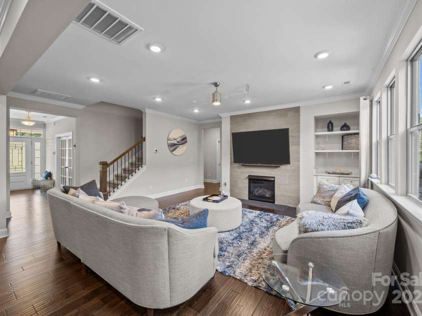 141 Rain Shadow Drive, Mooresville, NC 28115.  MLS# CAR4305913, YatesRealty ID 3144. Updated surround on fireplace & custom built-in