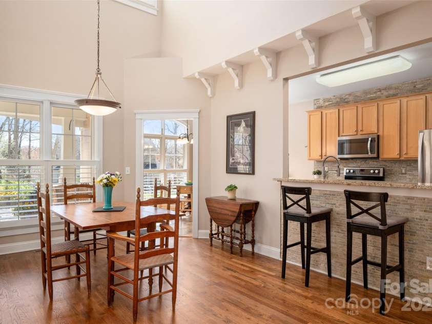 7806 Spanish Oaks Drive, Waxhaw, NC 28173.  MLS# CAR4235449, YatesRealty ID 3144. Dining Area and Kitchen Bar Counter