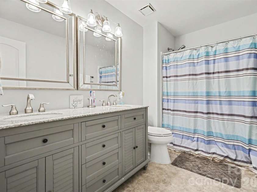 2219 Rock Rest Road, Wingate, NC 28174.  MLS# CAR4383329, YatesRealty ID 31441. Primary Bathroom