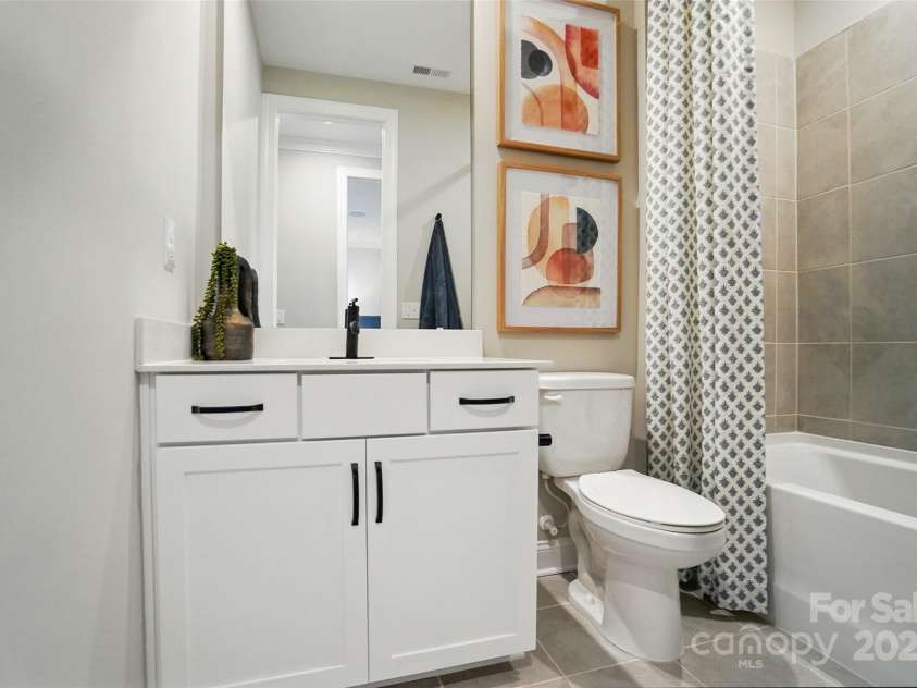 12069 Lavinia Lane, Charlotte, NC 28277.  MLS# CAR4284749, YatesRealty ID 31443. Representation only of hall bath