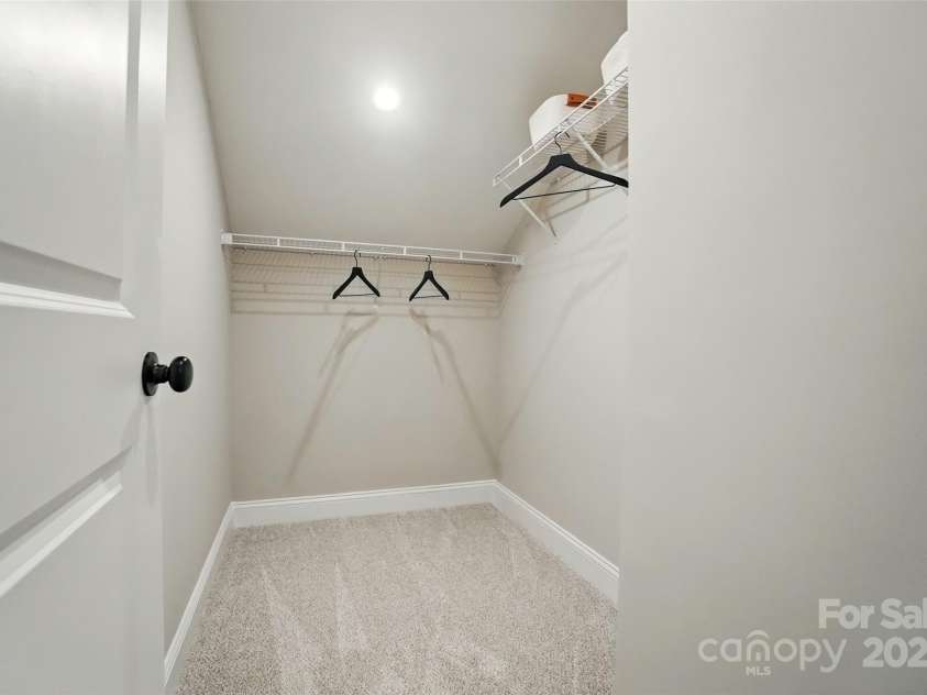 12069 Lavinia Lane, Charlotte, NC 28277.  MLS# CAR4284749, YatesRealty ID 31443. Representation only of walk in closet in 2nd primary