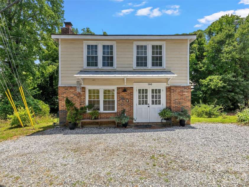 144 Howard Street, Tryon, NC 28782.  MLS# CAR4393484, YatesRealty ID 31447. 