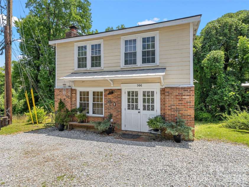 144 Howard Street, Tryon, NC 28782.  MLS# CAR4393484, YatesRealty ID 31447. 