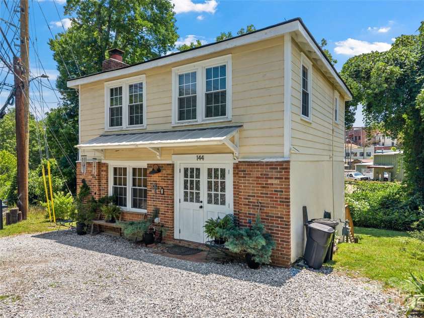 144 Howard Street, Tryon, NC 28782.  MLS# CAR4393484, YatesRealty ID 31447. 