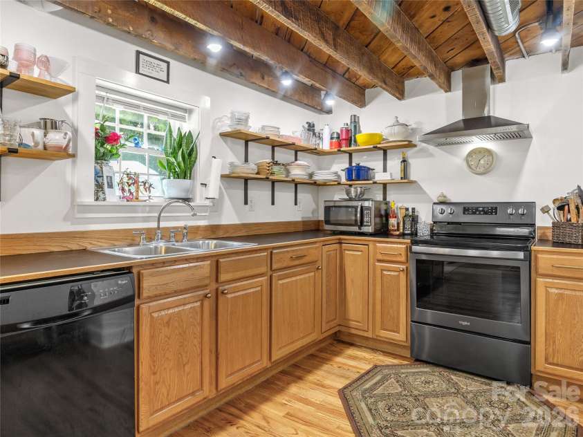144 Howard Street, Tryon, NC 28782.  MLS# CAR4393484, YatesRealty ID 31447. 