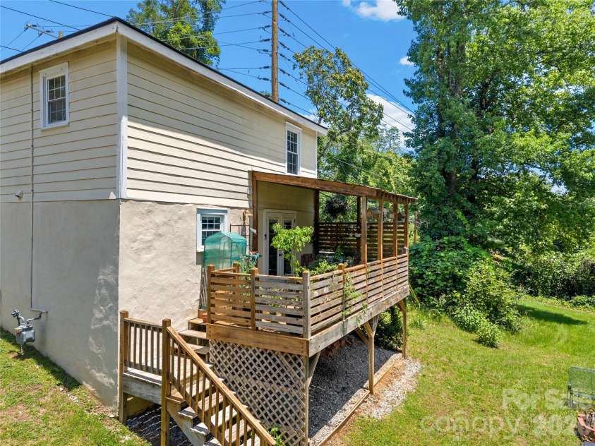 144 Howard Street, Tryon, NC 28782.  MLS# CAR4393484, YatesRealty ID 31447. 