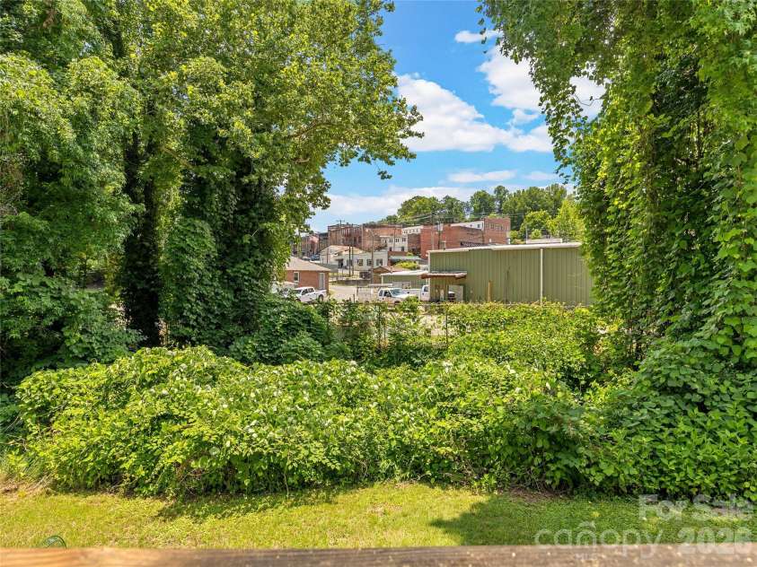 144 Howard Street, Tryon, NC 28782.  MLS# CAR4393484, YatesRealty ID 31447. 