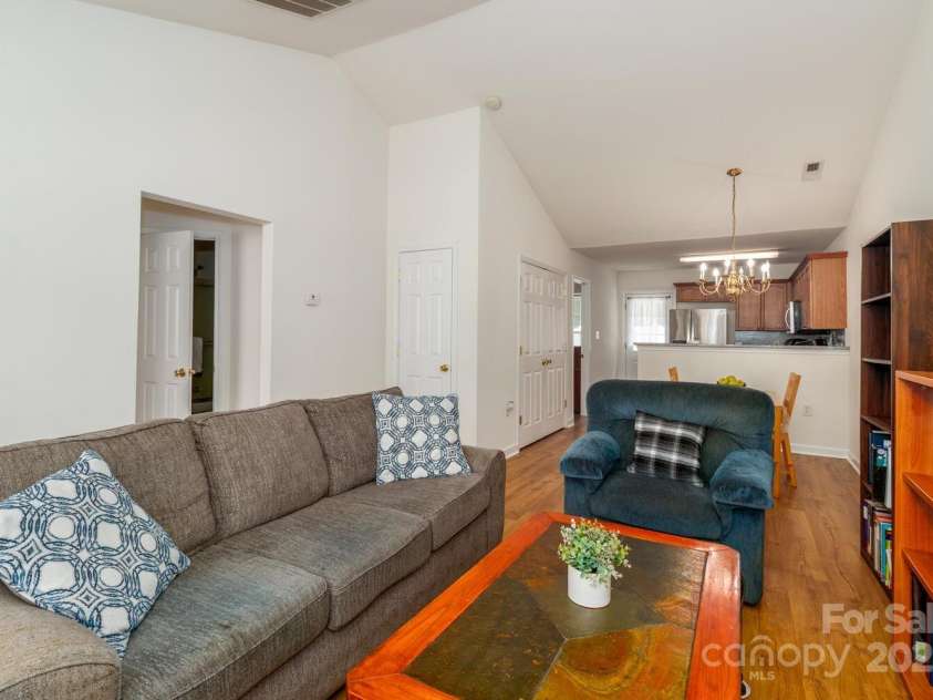 956 Olde Towne Way, Rock Hill, SC 29732.  MLS# CAR4284943, YatesRealty ID 31451. Living room view toward back of home