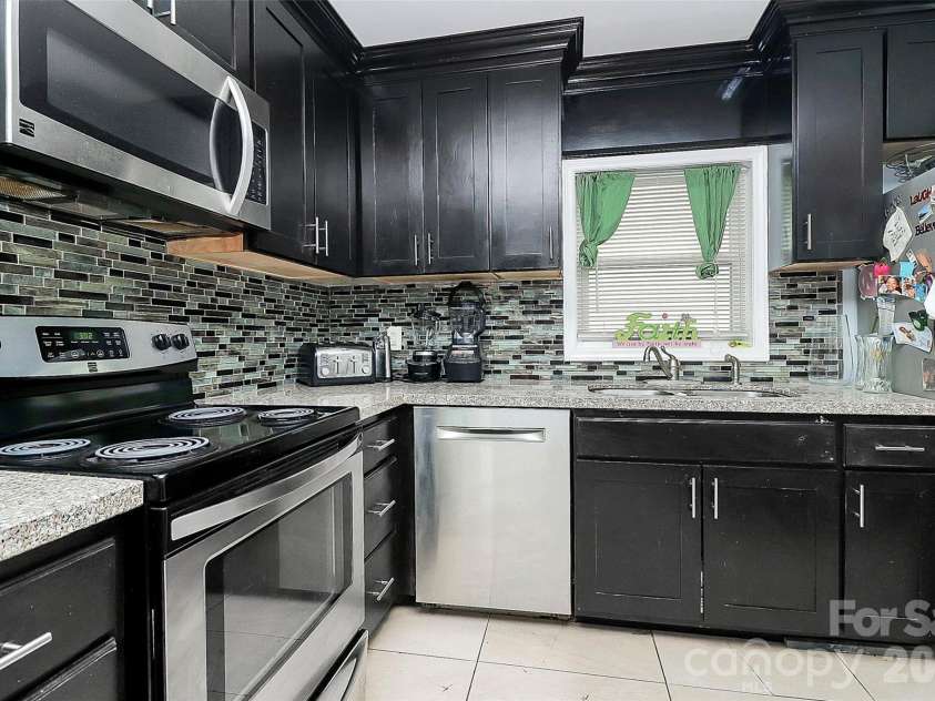 8301 Washington Boulevard, Charlotte, NC 28262.  MLS# CAR4390154, YatesRealty ID 31454. 