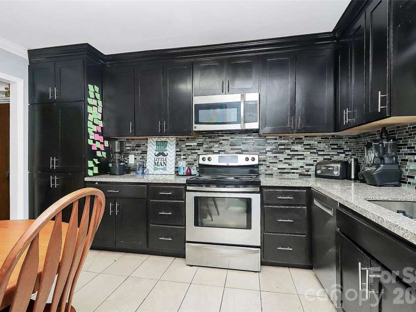 8301 Washington Boulevard, Charlotte, NC 28262.  MLS# CAR4390154, YatesRealty ID 31454. 