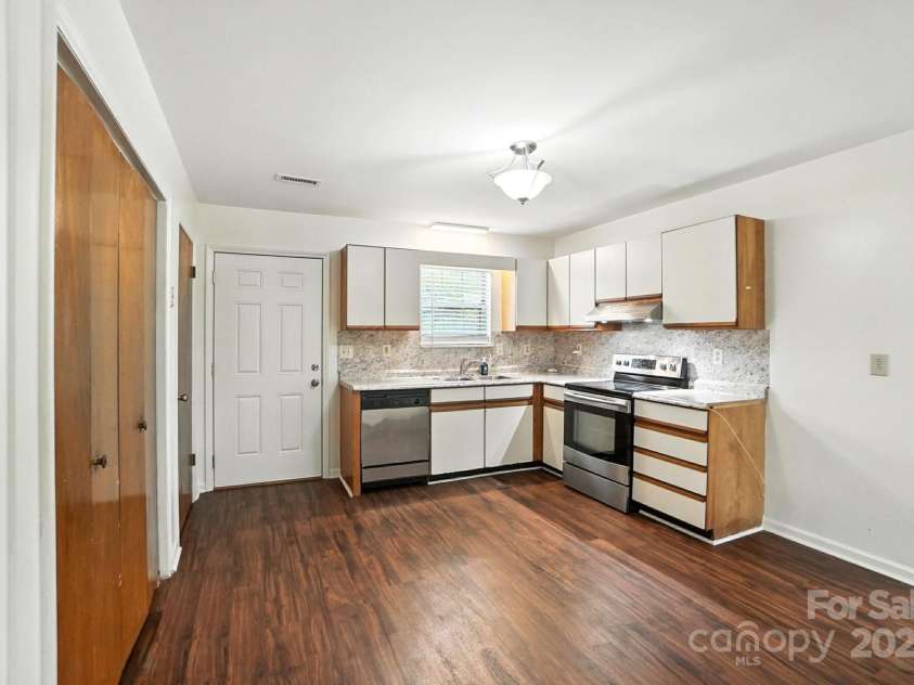 831 Flicker Street, Concord, NC 28027.  MLS# CAR4287829, YatesRealty ID 31455. Open concept kitchen w/ S/S appliances