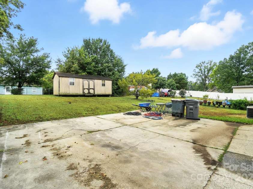 831 Flicker Street, Concord, NC 28027.  MLS# CAR4287829, YatesRealty ID 31455. Rear concrete parking pad