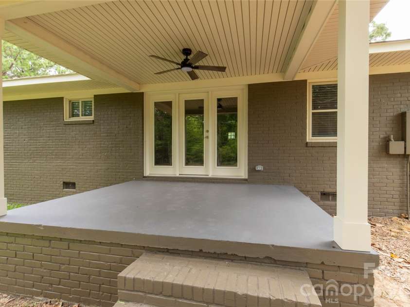 1297 Potter Road, Lancaster, SC 29720.  MLS# CAR4391936, YatesRealty ID 31456. Covered Back area