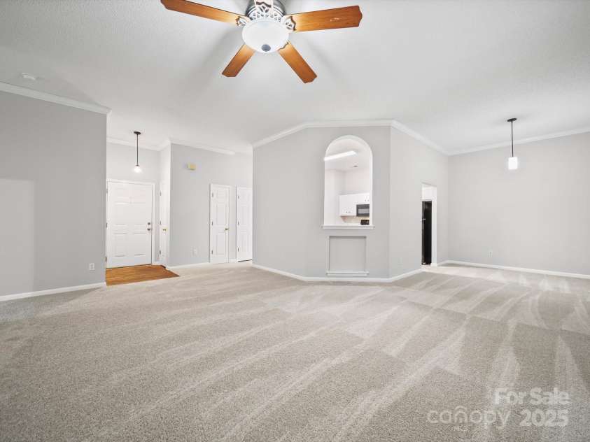 1020 Stinson Glen Lane, Charlotte, NC 28214.  MLS# CAR4279697, YatesRealty ID 31460. Living Room, Dining Area and Kitchen Views