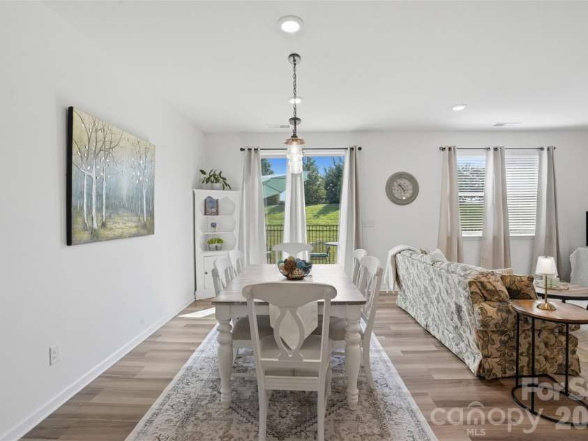 1011 Yearden Lane, Monroe, NC 28110.  MLS# CAR4392116, YatesRealty ID 31462. An oversized slider opens onto an inviting rear patio