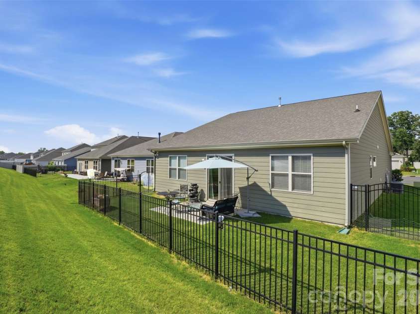 1011 Yearden Lane, Monroe, NC 28110.  MLS# CAR4392116, YatesRealty ID 31462. The perfect sized yard and fence for easy upkeep.