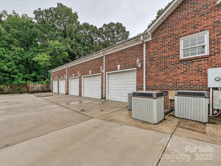 4900 Rocky River Road, Charlotte, NC 28215.  MLS# CAR4283934, YatesRealty ID 31470. 5-car oversized garage