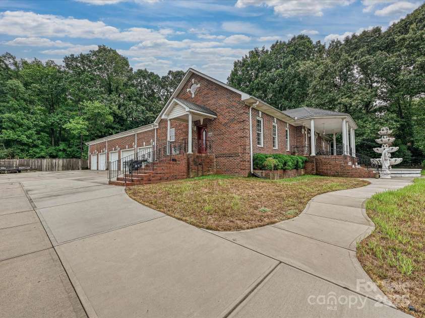4900 Rocky River Road, Charlotte, NC 28215.  MLS# CAR4283934, YatesRealty ID 31470. Another view of front & sides of 4900 Rocky River Rd.