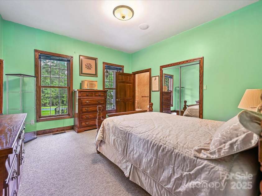 4900 Rocky River Road, Charlotte, NC 28215.  MLS# CAR4283934, YatesRealty ID 31470. Bedroom #2 has half bathroom