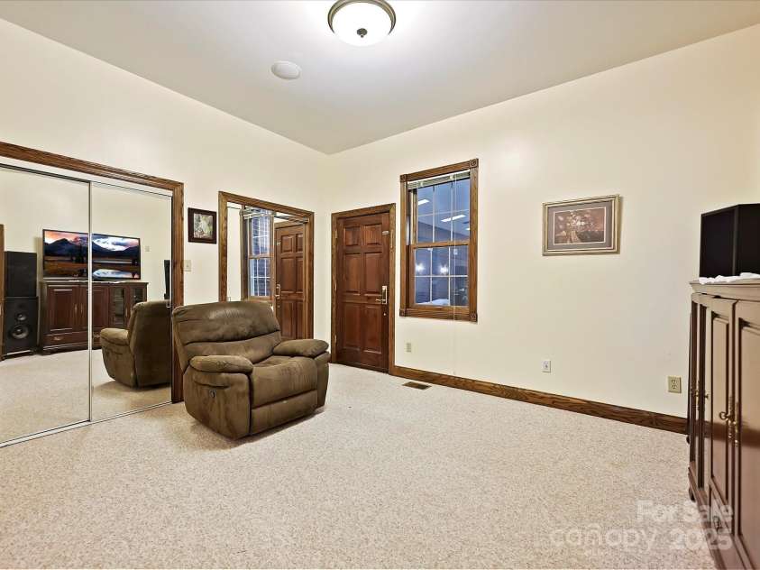 4900 Rocky River Road, Charlotte, NC 28215.  MLS# CAR4283934, YatesRealty ID 31470. Bedroom #3 has double closets & door enters into pool area