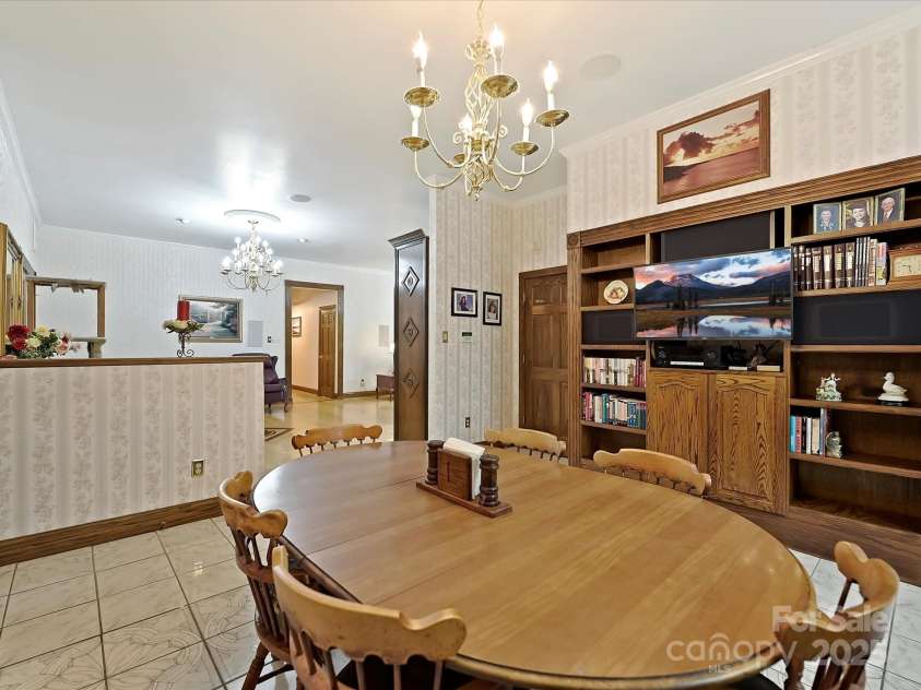 4900 Rocky River Road, Charlotte, NC 28215.  MLS# CAR4283934, YatesRealty ID 31470. Breakfast area has built in shelves/cabinet, walk-in pantry
