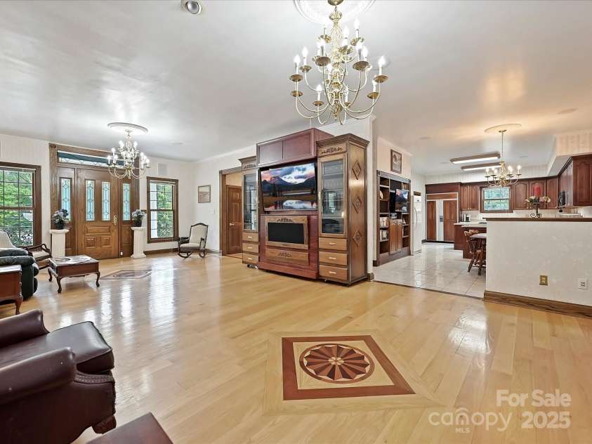 4900 Rocky River Road, Charlotte, NC 28215.  MLS# CAR4283934, YatesRealty ID 31470. LR view showing front door, & entry to Kitchen
