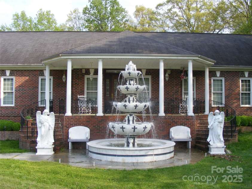 4900 Rocky River Road, Charlotte, NC 28215.  MLS# CAR4283934, YatesRealty ID 31470. Marble water fountain - fountain needs pump