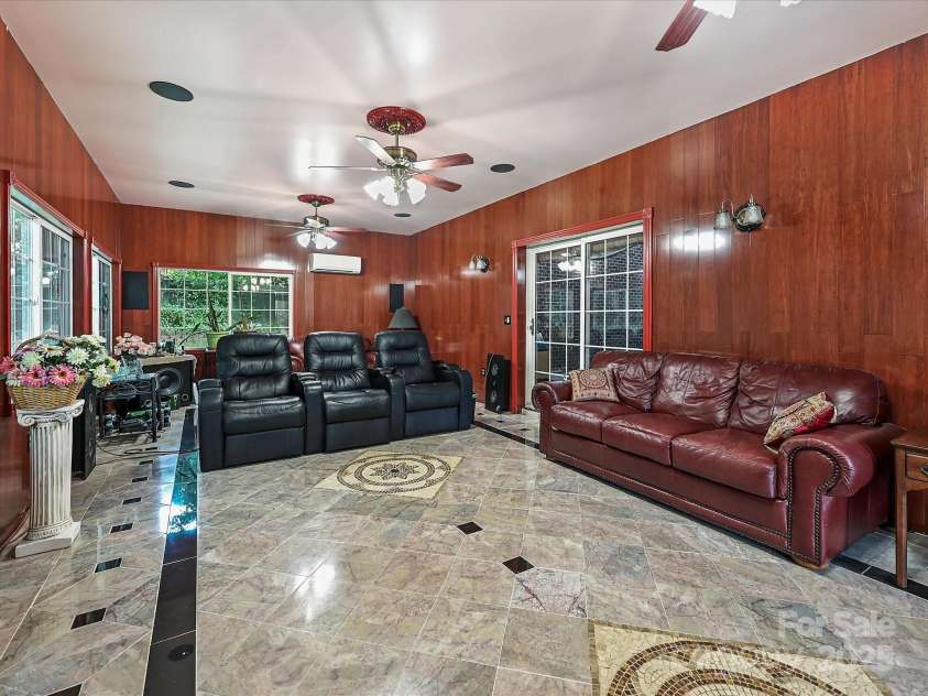 4900 Rocky River Road, Charlotte, NC 28215.  MLS# CAR4283934, YatesRealty ID 31470. Solarium off pool area has it's own cool/heat system