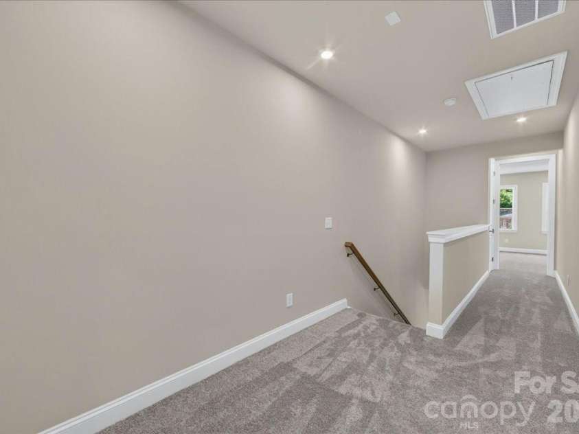 232 Old Town Village Road, Waxhaw, NC 28173.  MLS# CAR4394236, YatesRealty ID 31473. Third floor landing