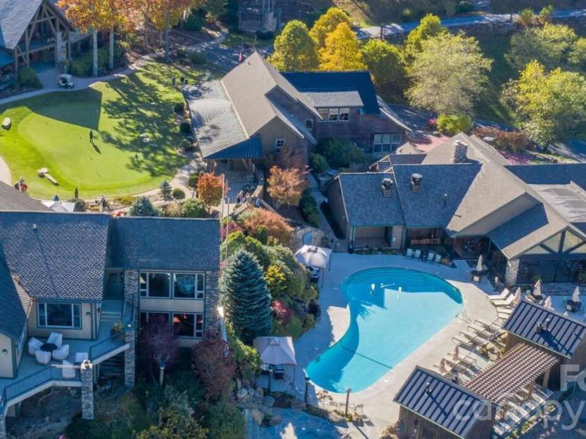 47 Falls Crossing Road, Burnsville, NC 28714.  MLS# CAR4393417, YatesRealty ID 31476. AMENITIES FOR ALL AGES