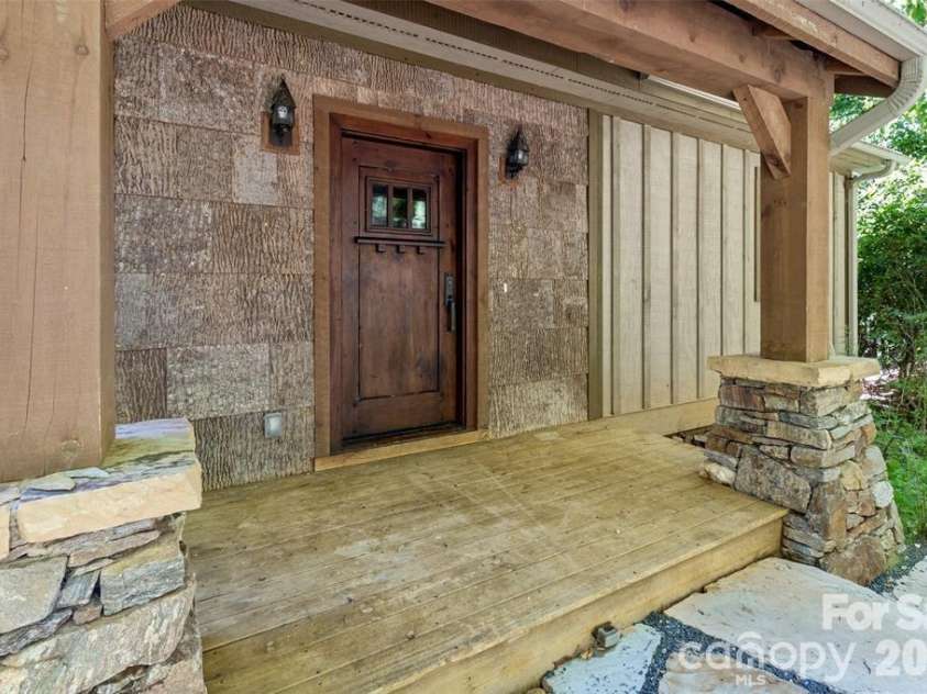 47 Falls Crossing Road, Burnsville, NC 28714.  MLS# CAR4393417, YatesRealty ID 31476. EASY ACCESS TO YOUR FRONT DOOR