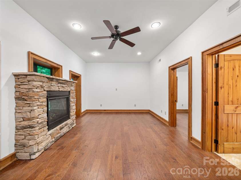 47 Falls Crossing Road, Burnsville, NC 28714.  MLS# CAR4393417, YatesRealty ID 31476. MEDIA/REC ROOM