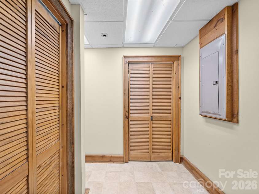 47 Falls Crossing Road, Burnsville, NC 28714.  MLS# CAR4393417, YatesRealty ID 31476. PLENTY OF STORAGE - LOWER LEVEL