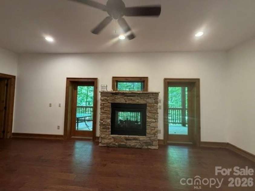 47 Falls Crossing Road, Burnsville, NC 28714.  MLS# CAR4393417, YatesRealty ID 31476. TWO-WAY FIREPLACE