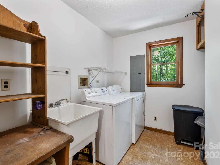 916 Coopers Gap Road, Mill Spring, NC 28756.  MLS# CAR4285214, YatesRealty ID 31476. Laundry Room