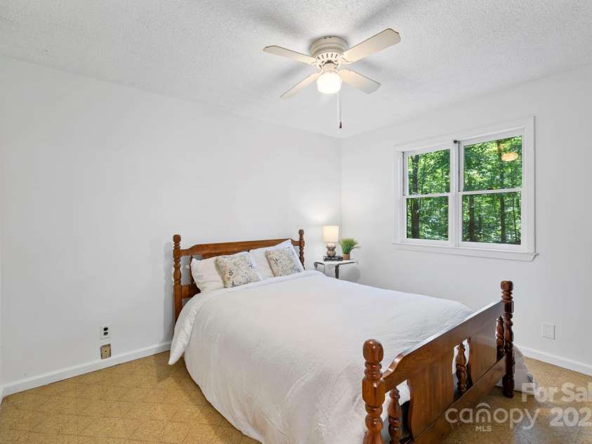 916 Coopers Gap Road, Mill Spring, NC 28756.  MLS# CAR4285214, YatesRealty ID 31476. Main level bedroom