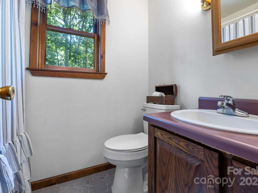 916 Coopers Gap Road, Mill Spring, NC 28756.  MLS# CAR4285214, YatesRealty ID 31476. Upstairs bathroom