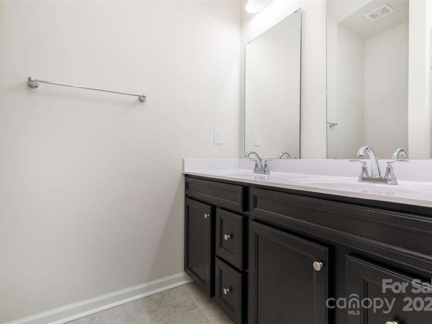 2103 Autumn Olive Lane, Matthews, NC 28104.  MLS# CAR4285192, YatesRealty ID 31479. Primary Bath
