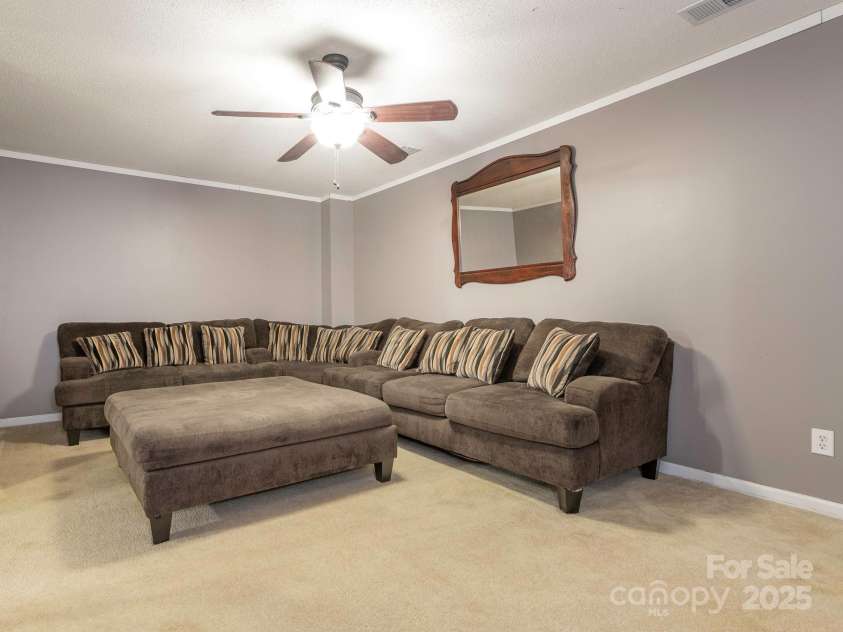 1554 Maypine Commons Way, Rock Hill, SC 29732.  MLS# CAR4286581, YatesRealty ID 31480. Basement Living Room