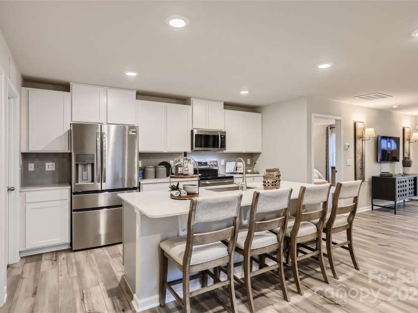 2153 Trollinger Drive, Catawba, NC 28609.  MLS# CAR4284816, YatesRealty ID 31482. Gorgeous Kitchen with white cabinets, quartz countertops, SS appliances, and a large center island