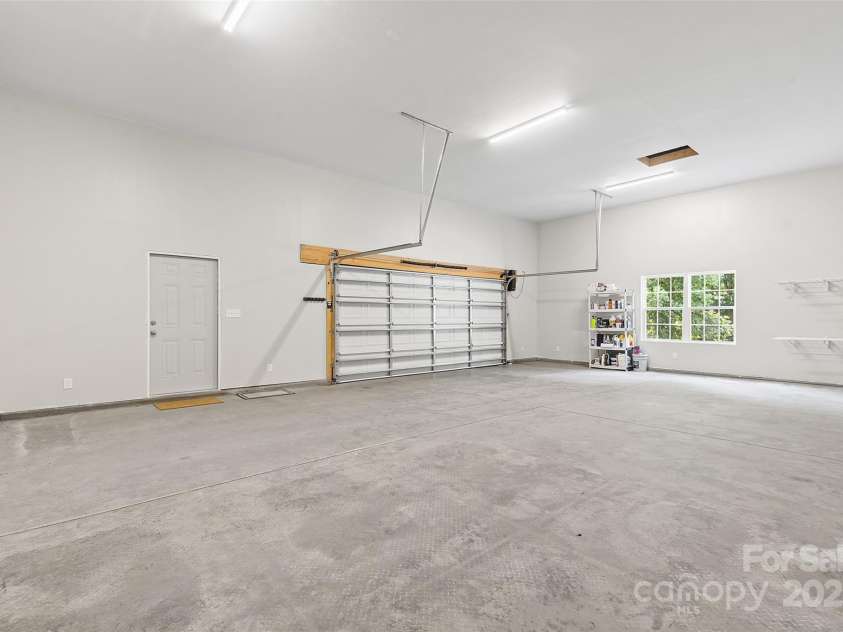 9027 Leah Meadow Lane, Charlotte, NC 28227.  MLS# CAR4285740, YatesRealty ID 31484. Oh, so may possibilities in the detached 3+ car garage!