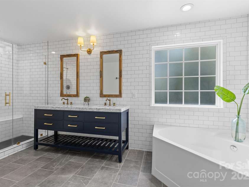 9027 Leah Meadow Lane, Charlotte, NC 28227.  MLS# CAR4285740, YatesRealty ID 31484. Spa-like Primary Ensuite Bath