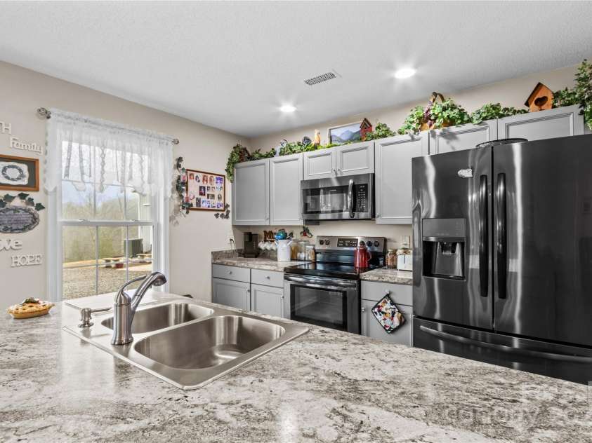 1595 Cheatham Ford Road, Hiddenite, NC 28636.  MLS# CAR4242263, YatesRealty ID 3149. 