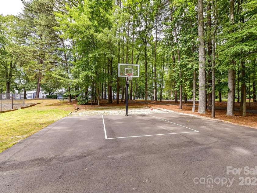 303 Northwest Drive, Davidson, NC 28036.  MLS# CAR4267438, YatesRealty ID 31490. Community Basketball Court!