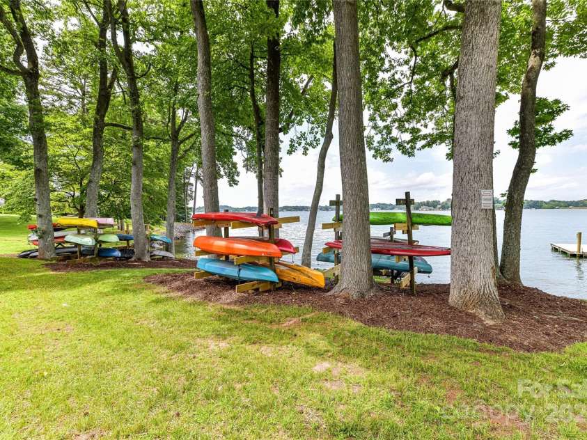 303 Northwest Drive, Davidson, NC 28036.  MLS# CAR4267438, YatesRealty ID 31490. Community Kayak storage!