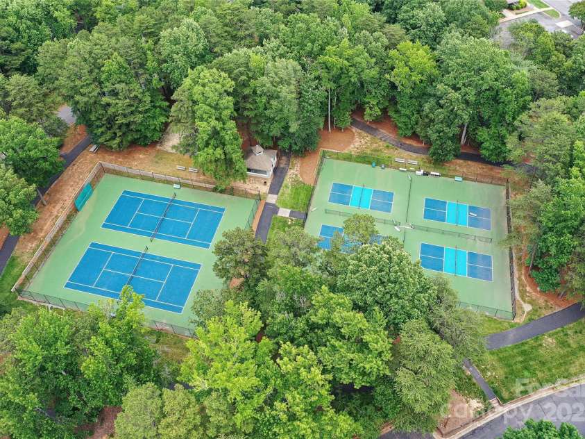 303 Northwest Drive, Davidson, NC 28036.  MLS# CAR4267438, YatesRealty ID 31490. Community Tennis & Pickleball Courts!