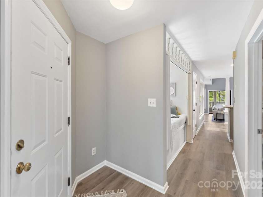 303 Northwest Drive, Davidson, NC 28036.  MLS# CAR4267438, YatesRealty ID 31490. Open, Airy, Bright, Waterfront Condo!