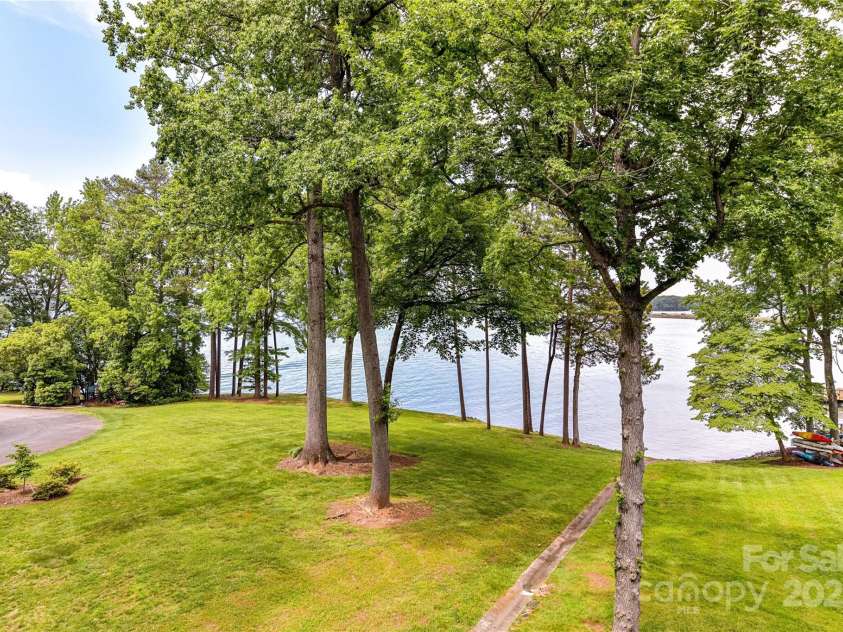 303 Northwest Drive, Davidson, NC 28036.  MLS# CAR4267438, YatesRealty ID 31490. View from your private, covered balcony overlooking gorgeous Lake Norman!