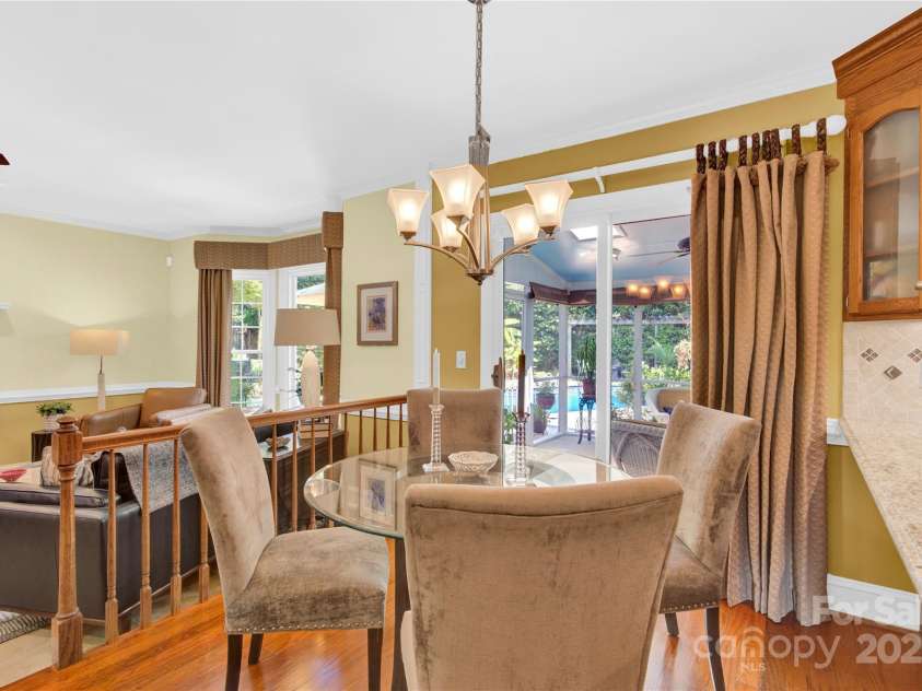 12532 Headquarters Farm Road, Charlotte, NC 28262.  MLS# CAR4275884, YatesRealty ID 31493. BREAKFAST AND FAMILY ROOM FOR CASUAL EVENINGS OF ENTERTDAINMENT